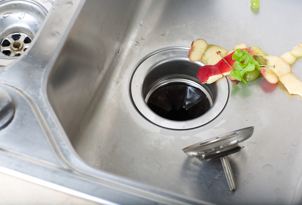 sink with food near the drain