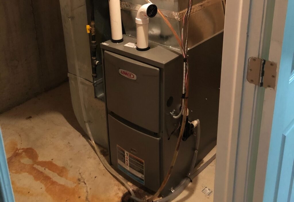 Technician testing a furnace during an annual tune-up